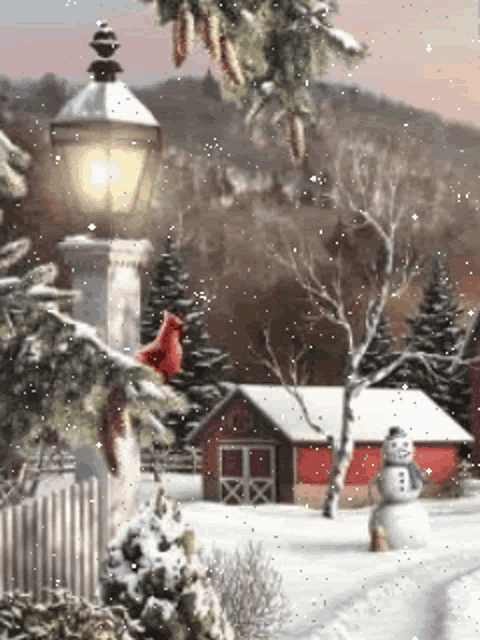 a cardinal is sitting on a lamp post in the snow near a snowman