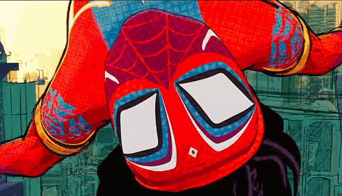 a cartoon drawing of a spider man hanging upside down with a city in the background