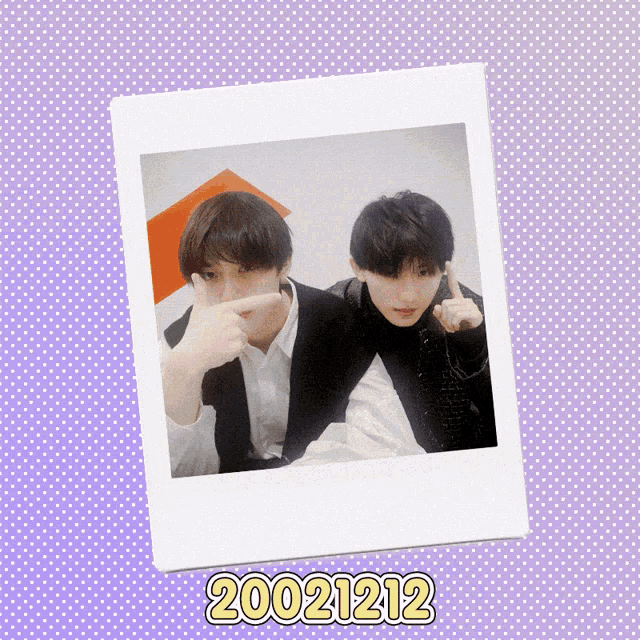 a picture of two men with the date 20021212