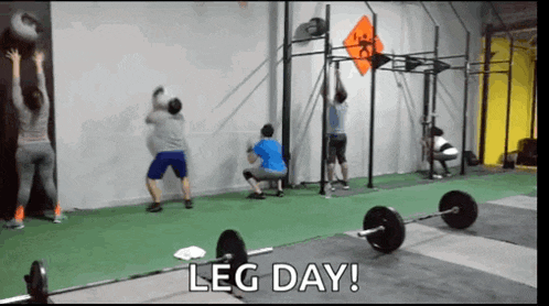 a group of people are doing exercises in a gym and the caption says leg day