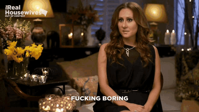 a woman sitting on a couch with the words fucking boring written on her face