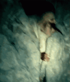 a painting of a person with a long beak laying on a bed