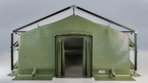 a large green tent with uvco written on the front