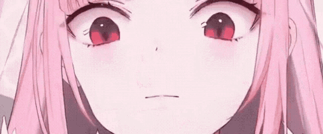 a close up of a girl with pink hair and red eyes making a face .