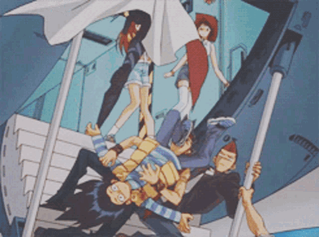 a group of people are standing on a set of stairs and one is laying on the ground