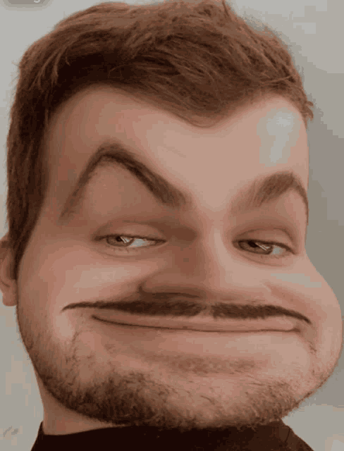a man with a beard makes a funny face with his eyes closed