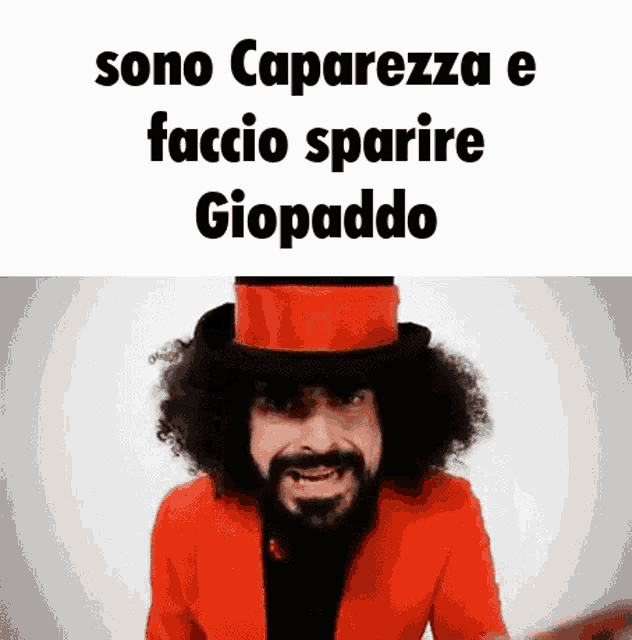 a man with curly hair and a beard is wearing a red jacket and a top hat .