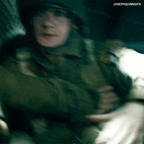 a blurry picture of a soldier with josephquinngifs written on the bottom