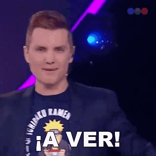 a man wearing a naruto shirt says a ver on the screen