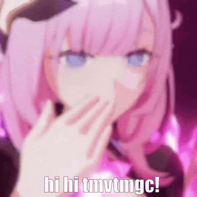a girl with pink hair and blue eyes is covering her mouth with her hands .