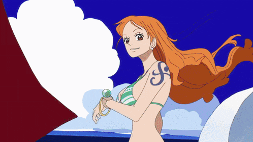 a woman in a bikini has the letter f tattooed on her shoulder