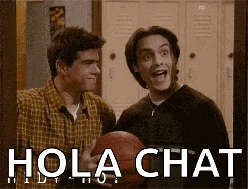 two men are standing next to each other holding a basketball and a sign that says hola chat