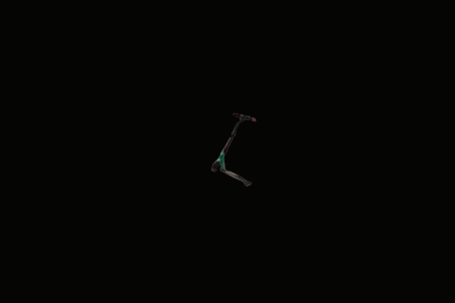 a person is riding a scooter in the dark