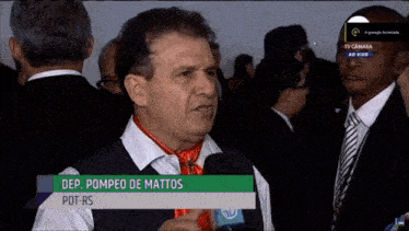 a man with the name dep.pompeo de mattos on a tv screen