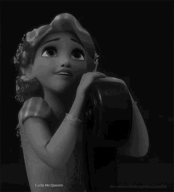 a black and white photo of a girl with the words lady mcqueen below her