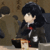 a girl in a suit is sitting at a table with a bowl of food in front of her .