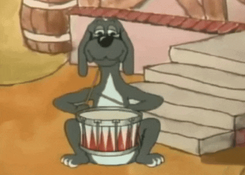 a cartoon dog is holding a drum in his paws