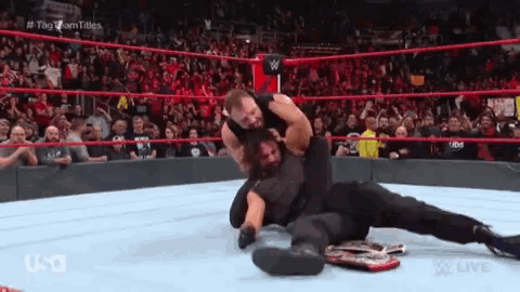 Dean Ambrose Attacking GIF - Dean Ambrose Attacking Beat Up GIFs