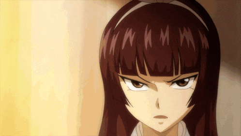 a close up of a girl 's face with a headband on her hair