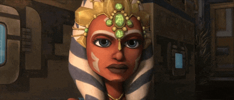 a close up of a cartoon character with a striped head scarf