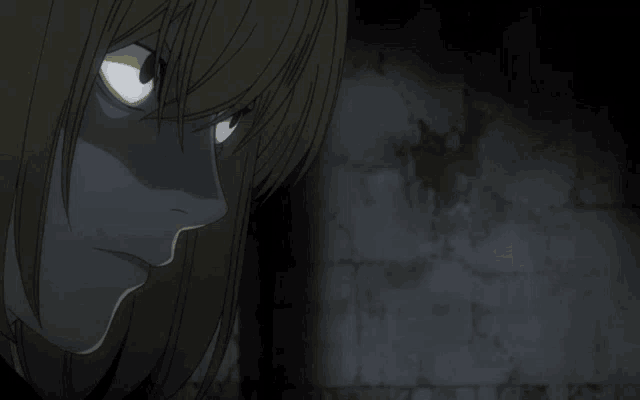 a close up of a blonde haired anime character