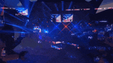 a person is taking a picture of a stage with their cell phone