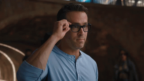 Lift Glasses Guy GIF - Lift Glasses Guy Ryan Reynolds GIFs