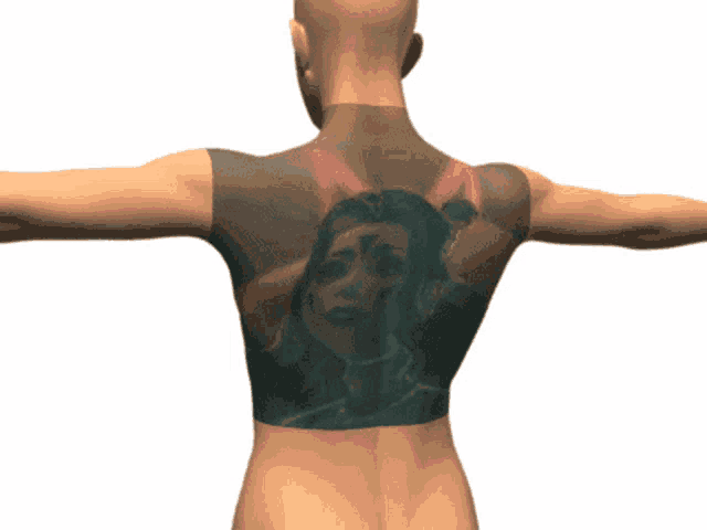 the back of a mannequin with a tattoo of a woman with a bow on her head
