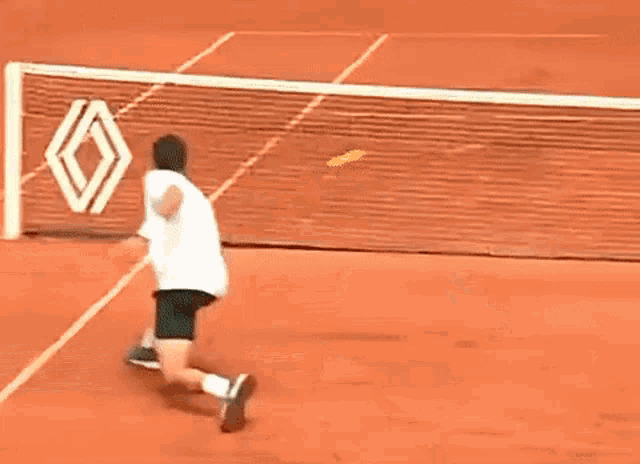 a tennis court with a bnp paribas sign on the wall