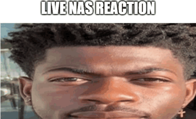 a close up of a man 's face with the words `` live nas reaction '' written on it .