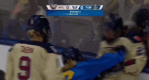 a hockey game is underway and the score is 0 to 0