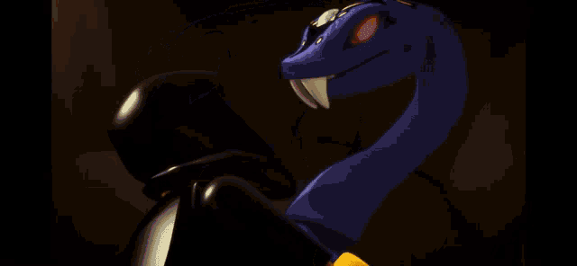 a blue and black snake with a yellow face