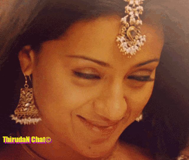 a close up of a woman 's face with the words thirulan chat on the bottom right
