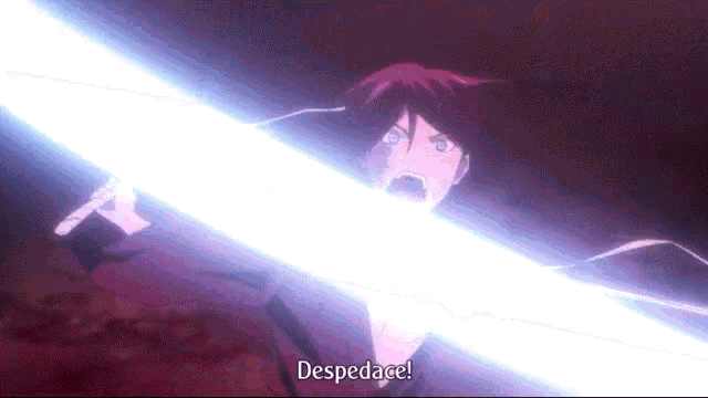 a person with red hair is holding a sword and the word despedace is visible