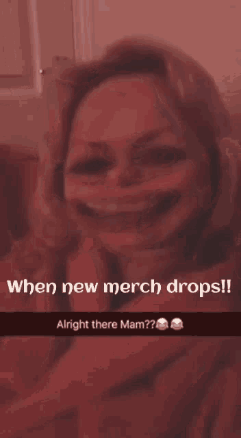 a woman is making a funny face and says when new merch drops