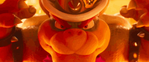a close up of a cartoon character wearing a hat and a crown .