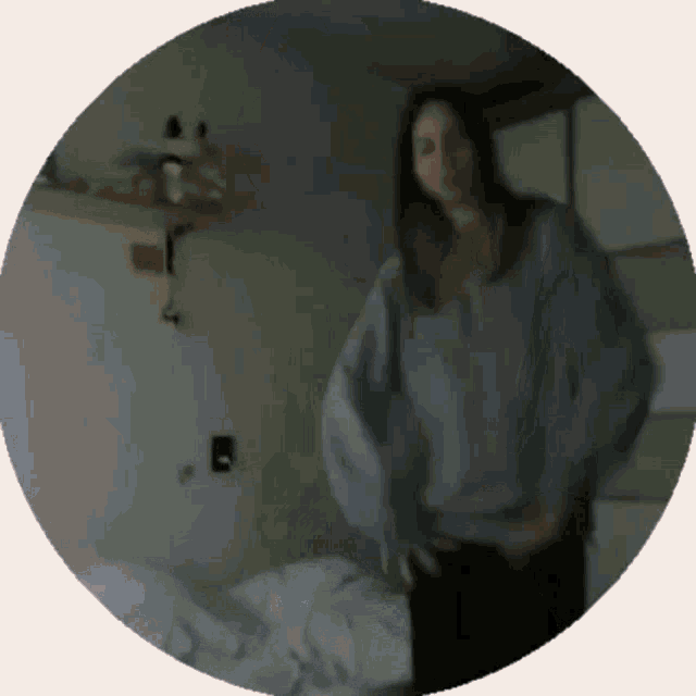 a blurry picture of a woman in a circle