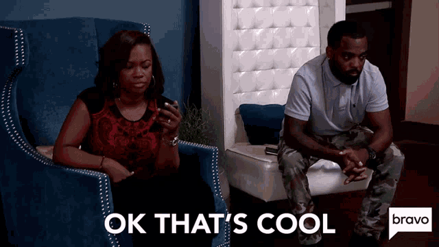 a woman sits in a chair next to a man who is sitting in a chair with the words ok that 's cool below them