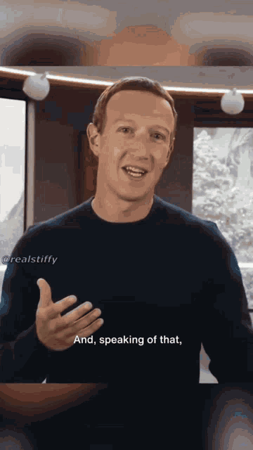 a man in a black sweater is talking and speaking of that