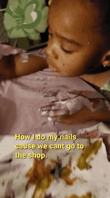a little girl is laying on a table with her nails painted and the words how i do my nails cause we cant