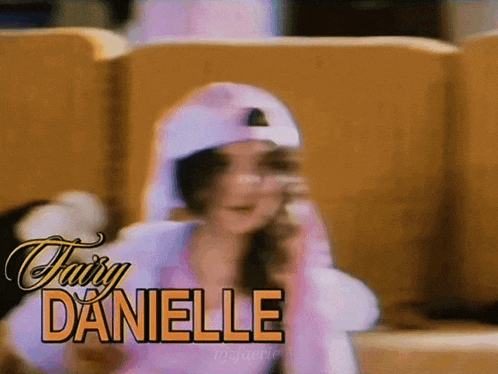 a blurry picture of a girl with the name danielle