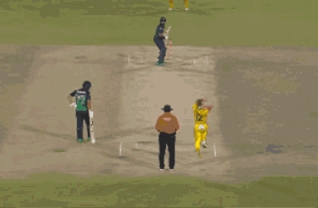 a man in a yellow qantas jersey is running