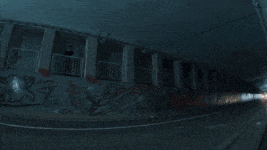 a tunnel with graffiti on the walls including the word zack