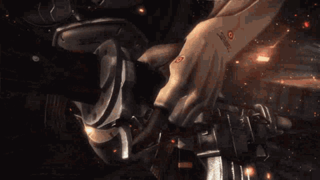 a hand with a tattoo on it is holding a gun