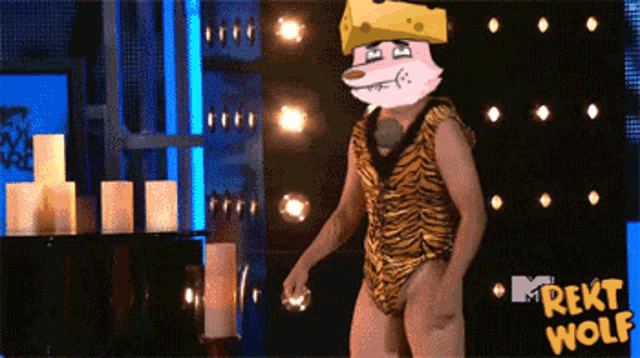 a man in a tiger print bathing suit is dancing in front of a sign that says ' rekt wolf '