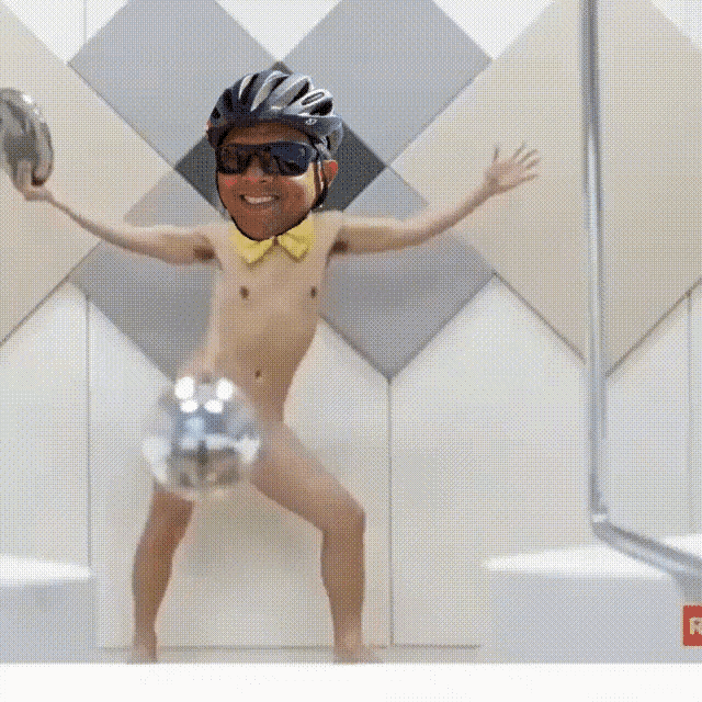 a naked man wearing a helmet sunglasses and a yellow bow tie is holding a disco ball