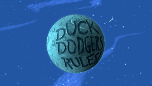 a moon with the words duck dodgers ruled written on it