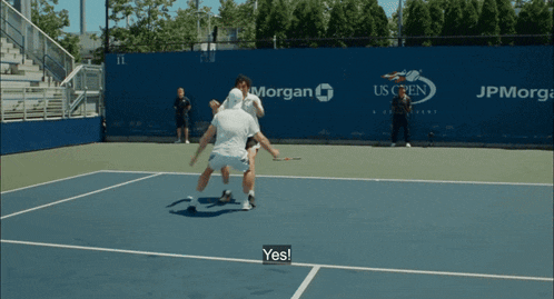 a tennis court with morgan and jpmorgan logos on the wall