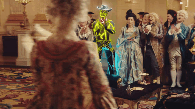 a man in a cowboy hat stands in front of a woman in a dress