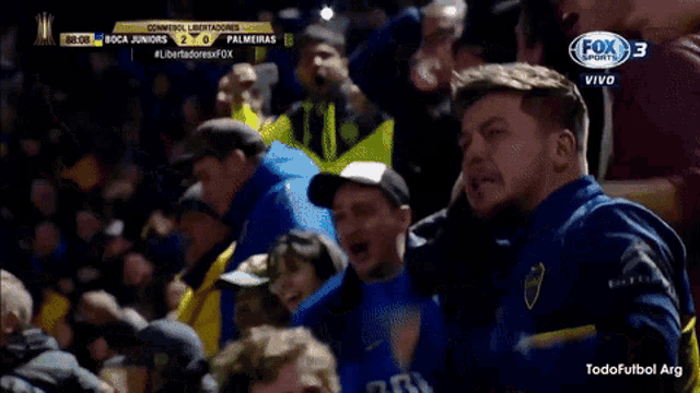 a soccer game is being played on fox sports